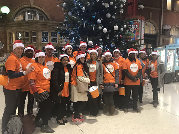 Our Corporate Partners sing for giggles at Marylebone Station!
